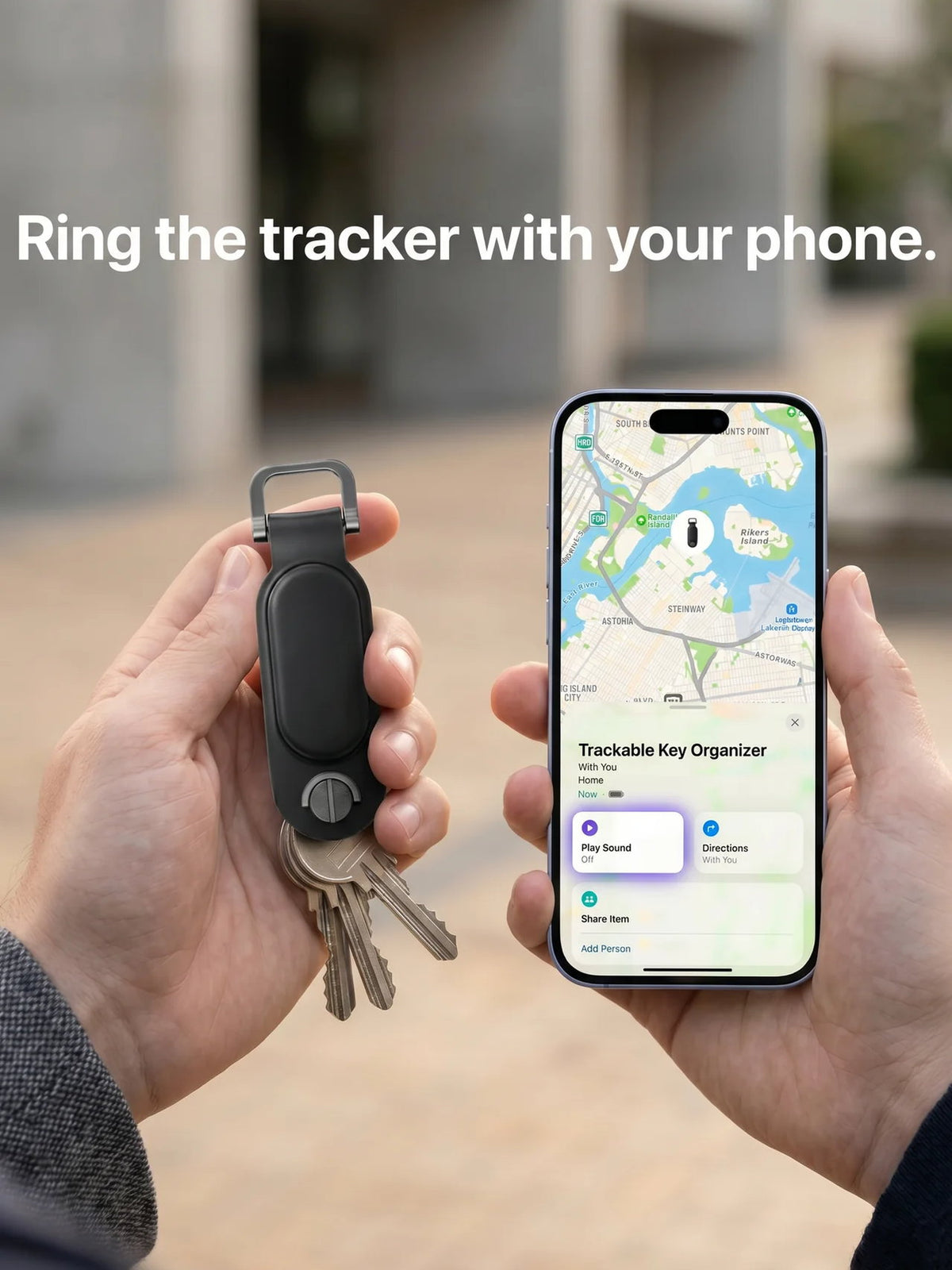 Hand holding the key organizer beside an iPhone using Play Sound in Find My